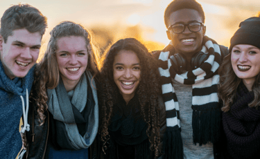 a group of friends posing for a picture