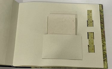 Album with marbled paper and decorative pages