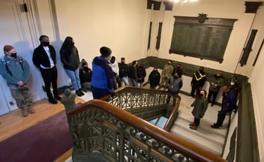 Dr. Hooton discussing Black history and memory with students at Cullum Hall at West Point tour