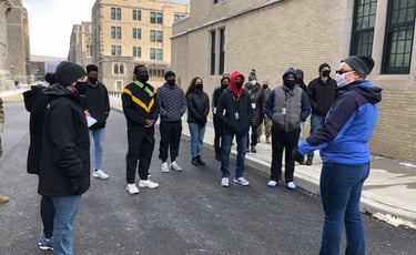 Dr. Hooton discussing first Black cadets outside Nininger Hall, West Point