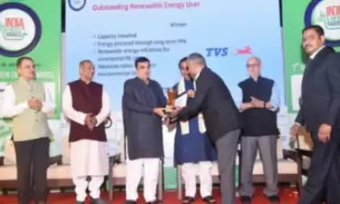 TVS Receiving Award
