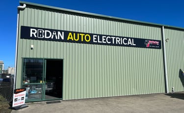 Signage on the front of our purpose-built auto-electrical workshop, parts and battery store.
