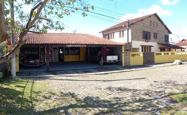 a house with a garage door and a car parked in front of it