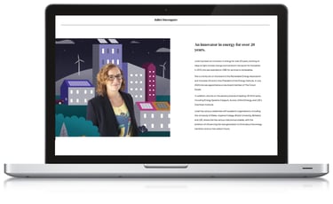 Web page with a woman sits in front of an illustrated scene of colourful a town on a laptop screen.