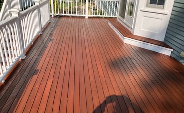 Deck staining and refinishing in Scituate, MA. completed by Michael Cummings Painting
