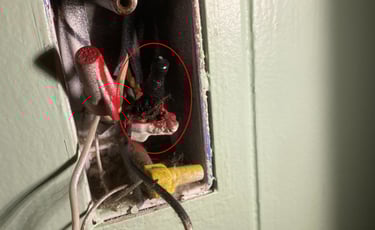 Burnt electrical wire nut in outlet box