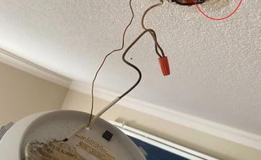 Improperly installed smoke detector burnt wiring