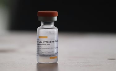 A COVID-19 vaccine vial.