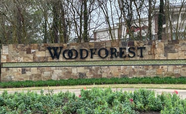 Woodforest sign: Trash Can Caddie, trash can valet services.