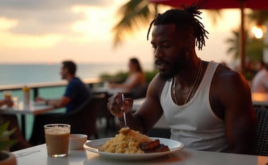 a man sitting at a restaurant eating a meal with rice and steak
