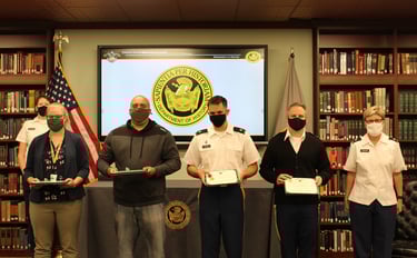 Laura Hooton (left) and other History Department members at an award ceremony at West Point, 2022