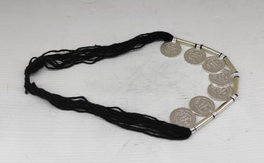 "Ethnic necklace with metallic coin pendants on black thread–tribal-style boho jewelry-for overseas markets"
