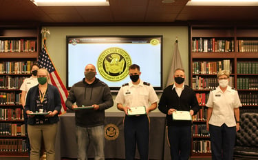 Laura Hooton (left) and other History Department members at an award ceremony at West Point, 2022