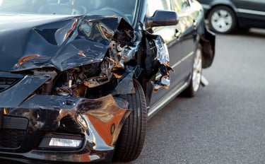 front damage after car accident black vehicle tampa street 2024