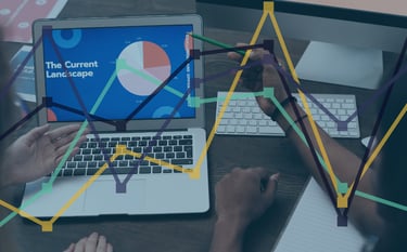 A graph over a laptop to symbolise AI in Ecommerce