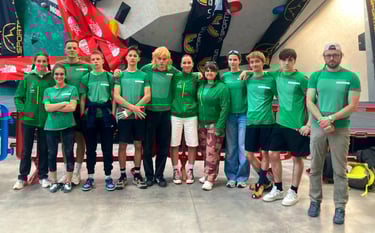 a group of people in green shirts 