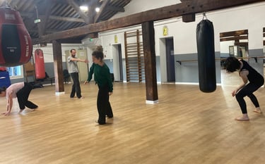 a group of people in a danse room