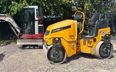 Twin-drum roller hire compacting new driveway in Stourbridge