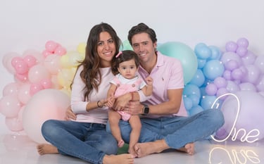 a baby boy in a circus themed birthday party