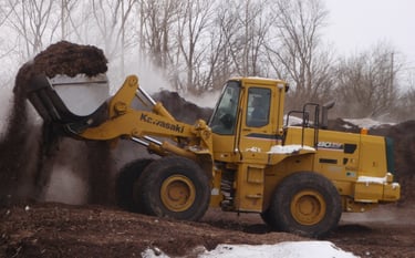 Wheel Loader Scooping Mulch