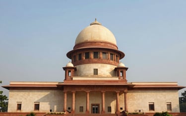 A prestigious, wide-angle photograph of the Supreme Court of India in New Delhi. The iconic dome and architecture are captured under a clear, bright morning sky, reflecting a sense of authority and justice. South Asian / Indian setting.
