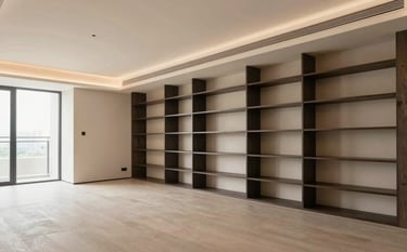 A wide-angle professional photograph of a completed luxury penthouse interior. The design features a palette of soft cream and warm taupe, with innovative dark charcoal shelving. The space is inspiring, professional, and serene.