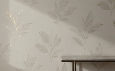 A close-up of a feature wall with elegant, sophisticated wallpaper featuring a subtle botanical motif in #4E6A5B and metallic accents. Beside it, a minimalist console table under soft, directional gallery lighting. Professional and aspirational vibe.