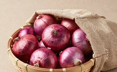 A clean, modern warehouse interior with stacks of wooden crates filled with vibrant, fresh green apples and citrus fruits. Professional lighting, high-angle view showing scale and efficiency. Brand colors #1A3B2B and #F7FAF6 integrated via shadows and highlights.