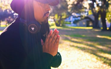 Cesar Pagan meditating within the trees