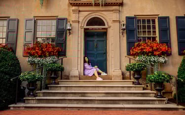 Senior Pictures of a girl in a purple dress by a Senior Picture Photographer in Lancaster PA