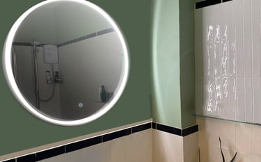 Image of bathroom after redesign, long gloss tiles and green paint make the bathroom calm