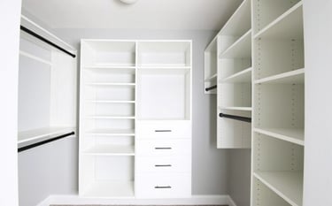 a closet with a white closet and a white closet