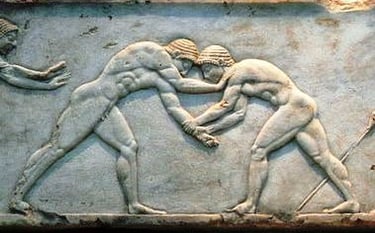 Αρχαία πάλη σε μάρμαρο Πεντέλης. By Fingalo, https://el.wikipedia.org/wiki/Πάλη 