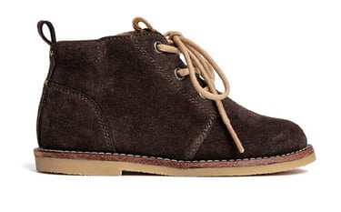 Product photography - a brown sued boot with a light brown lace