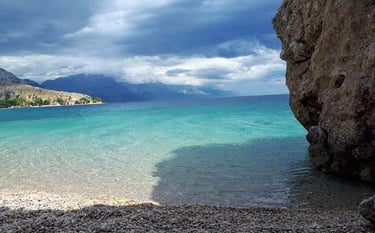 The photo shows the westernmost part of Artina Beach.