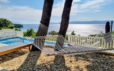 The photo shows part of the private pool of the house in Lokva Rogoznica and an unobstructed sea vie