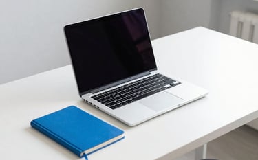 A sharp, high-key photograph of a modern, minimal workspace in a North American city. A sleek laptop sits on a clean white desk next to a bright sapphire blue notebook. The lighting is crisp and professional, emphasizing a mood of speed and clarity.