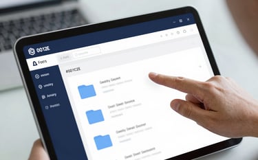 A close-up of a high-resolution tablet screen showing a clean, organized digital filing system with folders. A professional hand is subtly pointing at a document. The background is a blurred modern office setting. The palette features deep blues (#0D1C2E) and sophisticated grays (#F5F7F8), emphasizing digital security and order.