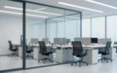 A clean, bright professional office interior with modern minimalist furniture. A glass wall reflects a soft blue light. The overall mood is high-end corporate, focusing on precision and clarity, incorporating subtle tones of #1A2C38 and #F8F9FA.