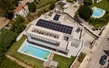 a house with solar panels installed on a roof