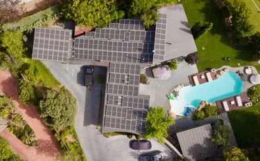 a house with solar panels installed on a roof
