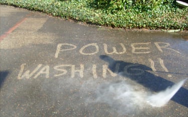 Driveway patio cleaning with a pressure washer