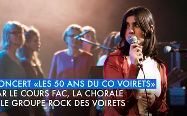 a woman singing into a microphone with a microphone