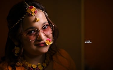 Bride wearing haldi costumes and accessories