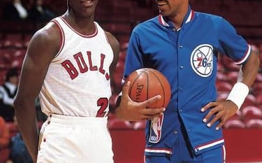 Michael Jordan (left) and Julius Erving (right) pose for a picture in 1984