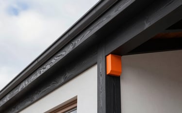 Close-up architectural detail photography of a finished premium residential project in Northern Europe / Finland. Showcasing fine carpentry and polished textures. Soft cloud white lighting, deep charcoal black wood accents, vibrant safety orange details for visual pop.