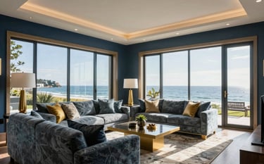 A luxury North American / US coastal home interior showcasing sophisticated real estate staging. The room features slate blue and muted gold accents, large windows, and an atmosphere of professional elegance.