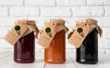 Logo projet la vache verte sur pots de confiture 