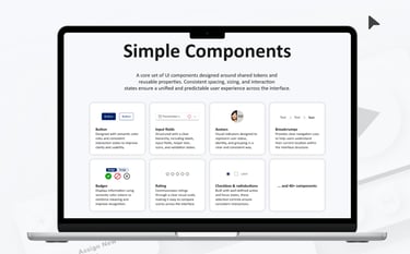 Laptop displaying a UI design system library with simple components like buttons, input fields, and badges.