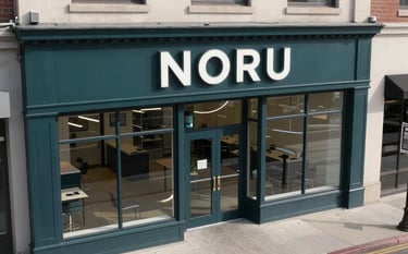 A high-angle shot of a professional North American / US commercial storefront in a clean downtown area. The lighting is crisp and clear. The scene features deep charcoal teal tones in the architectural details, conveying authority and a pest-free business environment.